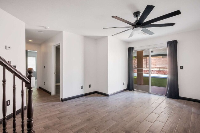 Building Photo - Charming single-story townhome featuring two bedrooms, two bathrooms, and an attached two-car gar...