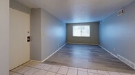 Located at 670 Prospect St in Berea, Ohio, this single-floor, one-bedroom, one-bathroom unit offers a well-organized and functional layout. The combined living and dining area serves as the heart of the unit, featuring durable laminate wood flooring, cool-toned gray walls, a ceiling fan, and a window that brings in natural light. The space transitions seamlessly to a tile-floored hallway connecting the remaining rooms. The kitchen is equipped with white appliances, including a refrigerator and electric range, complemented by warm wood-toned cabinetry and tile flooring. The bedroom is carpeted for comfort, featuring a large window with an outdoor view, providing a bright and quiet retreat. The bathroom includes a full tub and shower combo with clean white surrounds. Three closets offer generous storage throughout the unit, while a dedicated utility room adds practical functionality. The unit's cool gray palette, consistent throughout, creates a calm and cohesive atmosphere. With its compact yet complete layout, this unit provides all the essential spaces needed for comfortable everyday living.