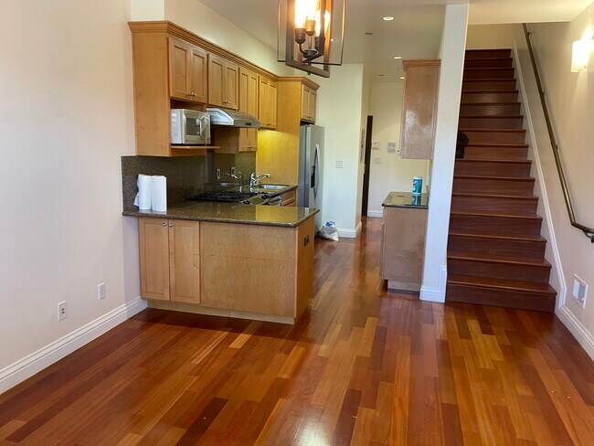 View from living area, note the 2 person bar area - 2577 Bryant St