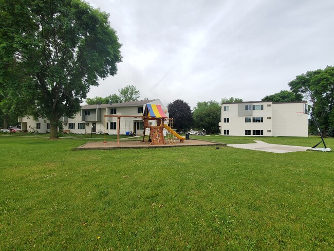 playground and basketball - Northwood Apartments, a Section 8 Community