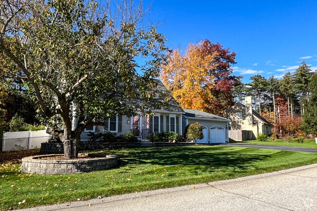 Homes on well-manicured yards are common in the Merrimack neighborhood.