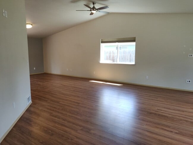 Building Photo - Charming 4-Bedroom Home on 1/2 Acre with a Fenced Backyard, Fully Insulated Double-Car Garage, in...