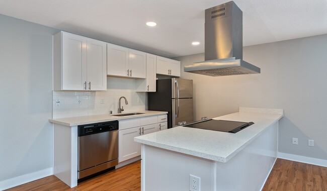 Renovated kitchens with premium finishes are available for upgrade. Ask the leasing team for more details. - Hidden Cove Apartments