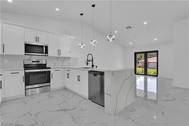 Foto del edificio - 4921 Leonard Blvd S