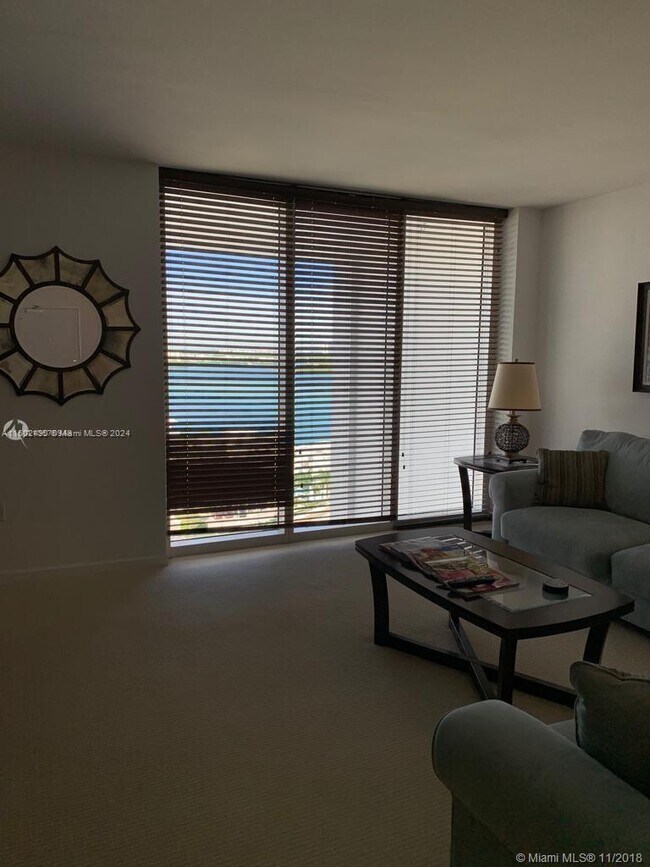 Building Photo - 10275 Collins Ave