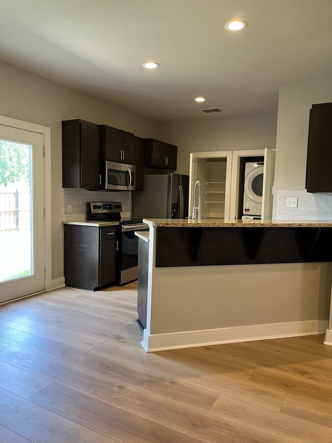Kitchen/laundry - 10660 Brothers Ln