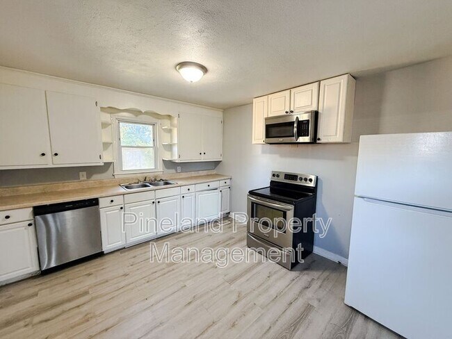 Foto del edificio - 5124 Palmetto Ln