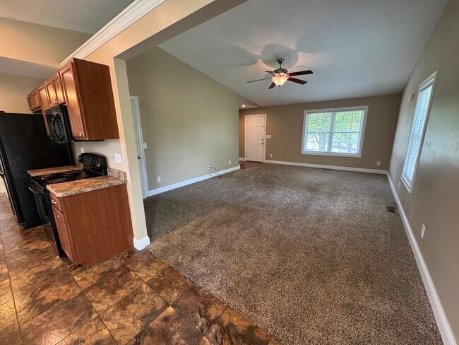 Large vaulted living room with beautiful views from all windows. - 1343 Easy St