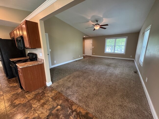 Large vaulted living room with beautiful views from all windows. - 1343 Easy St