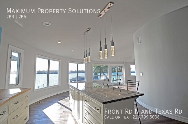 Building Photo - ALL INCLUSIVE! Stunning Waterfront Home