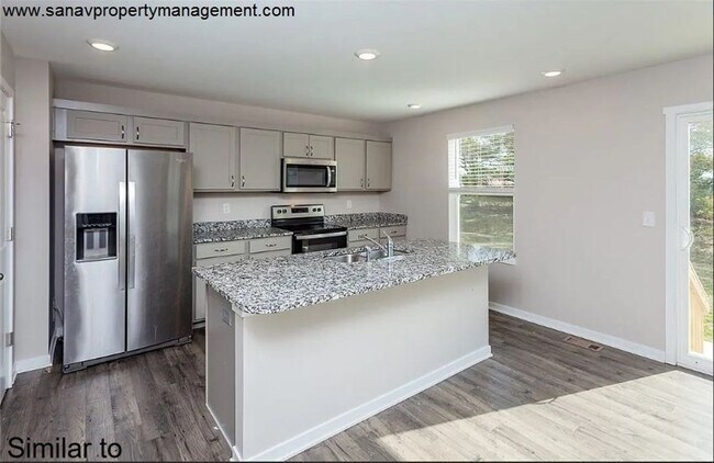 Foto del edificio - "Ankeny Oasis: Luxurious 4-Bedroom Home with Expansive 3-Car Garage and Secluded Backyard Retreat!"