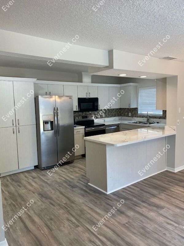 Building Photo - 7218 N Highland Ave