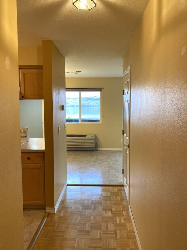 Building Photo - Ground Level River View Condo