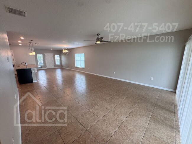 Building Photo - Stylish & Spacious 4-Bedroom Home in Grove...