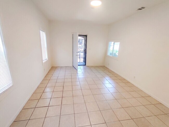 Building Photo - Modern Upgrades w/ Classic Oakland Charm & Driveway Leading to Rear Yard
