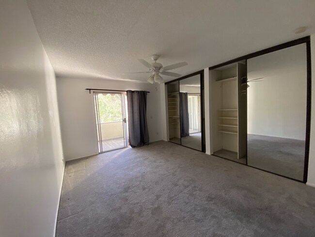Large bedroom w/patio access - 1935 Alpha Rd