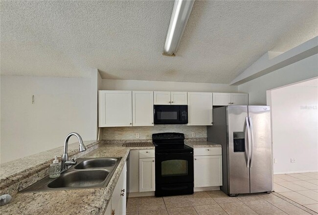 Building Photo - 4741 Alexis Dr