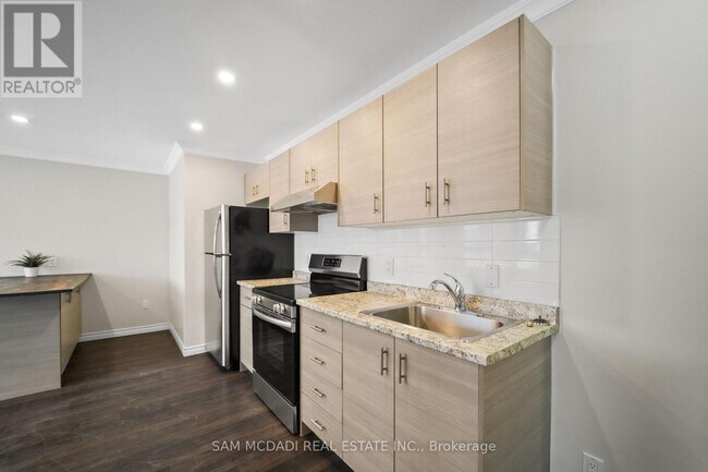 Photo du bâtiment - 130 King St E