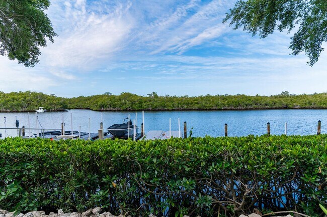 Building Photo - BOAT NATURE OR WATER ENTHUSIASTS? *** OFFERED PARTIALLY FURNISHED OR COMPLETELY UNFURNISHED ** EN...