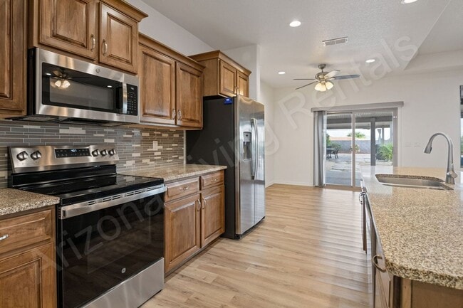 Building Photo - INVITING BACKYARD OASIS