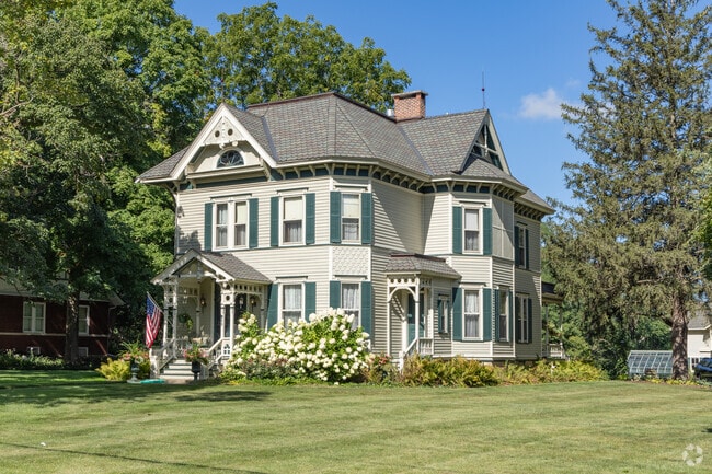 Oswego's downtown is lined with large, stately two-story Victorian homes.