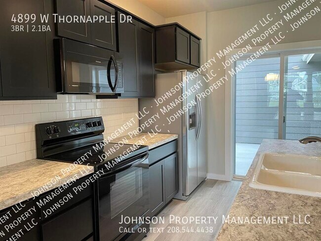 Foto del edificio - 4899 Thornapple Dr