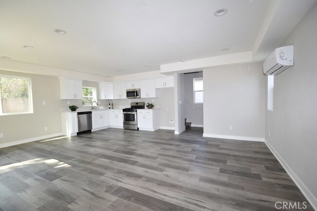 Living Room / Kitchen. - 7305 Ensign Ave