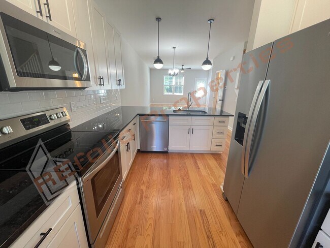 Building Photo - Amazing 2023 Built 2 Bedroom 2.5 Bath Town...