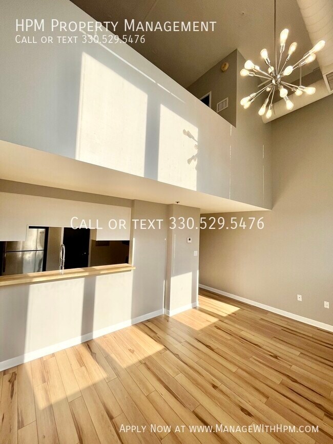 Building Photo - Water Street Apartments - first month rent...