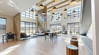 This thoughtfully designed two-floor space offers a generous and versatile environment ideal for collaboration, focused work, and social gathering. The ground floor makes an immediate impression with its dramatic double-height ceilings, exposed wood beam accents, and walls of steel-framed floor-to-ceiling windows that flood the interior with abundant natural light and provide sweeping outdoor views. Light hardwood flooring runs throughout, complementing the airy, modern aesthetic. The open layout accommodates multiple seating configurations, including high-top communal tables, lounge sofas, and casual seating clusters, all anchored by a striking vertical slatted wood installation. Oversized pendant lighting in matte black adds an industrial-modern touch overhead. A sleek metal staircase with cable railings connects to the upper floor, where the atmosphere transitions to a more intimate scale. The second level features plush patterned carpeting and private booth-style seating set against warm wood paneling and bold blue patterned accent walls. Dedicated private work alcoves with built-in desks, textured stone-effect wallcovering, and curated artwork provide focused, quiet workspaces. Exposed beam ceilings and large windows continue throughout the upper level, maintaining visual continuity and connecting both floors through a cohesive, contemporary design language.