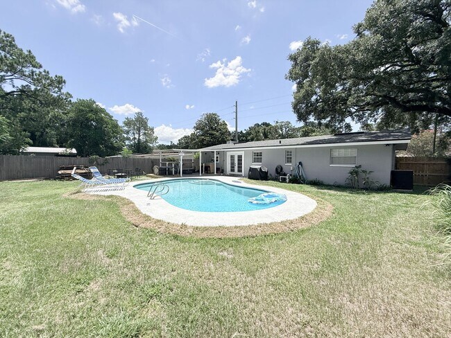 Building Photo - Renovated Pool Home with Private Backyard Oasis
