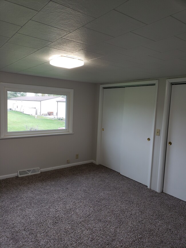 Main bedroom with wall of closets - 12536 Wicker Ave