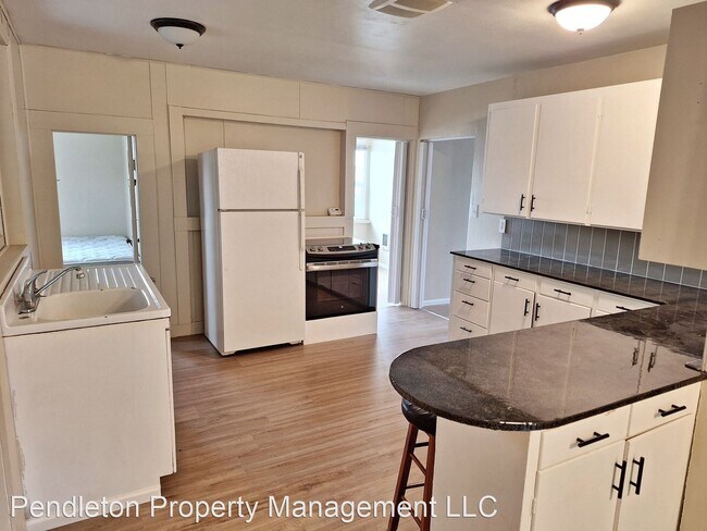 Building Photo - 3 br, 1 bath House - 1116 NW Despain Apt B