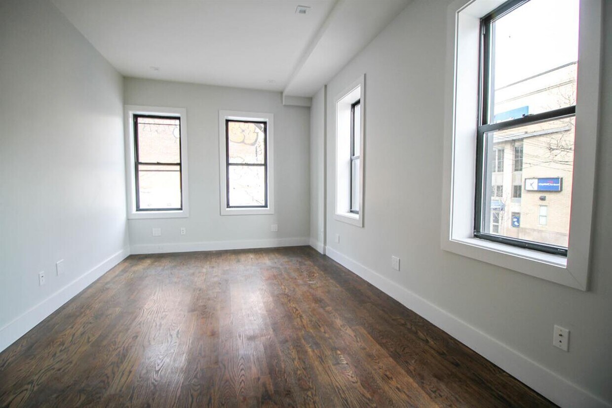 Building Photo - 58-25 Myrtle Ave