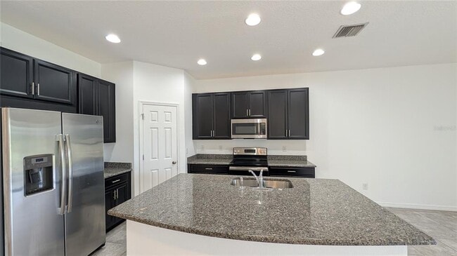 Building Photo - 7046 Grand Elm Dr