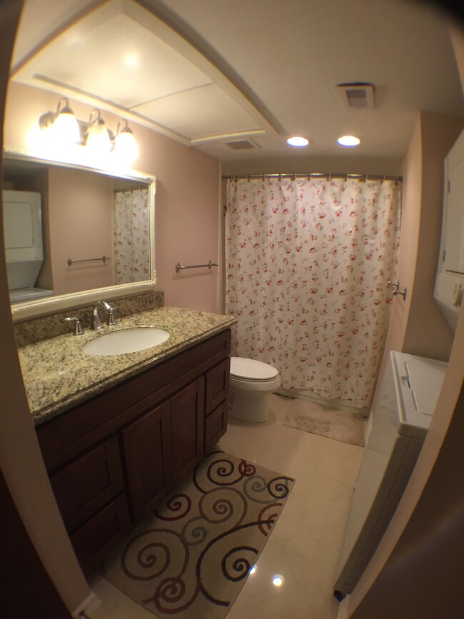 Updated bathroom with granite and marble tiles - 7555 Katy Freeway