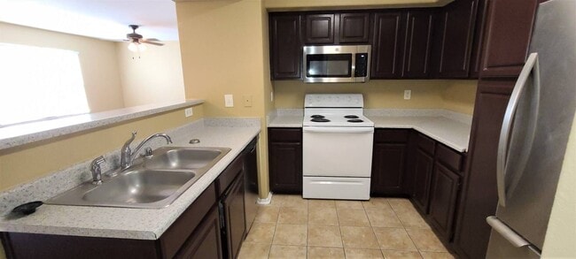 Building Photo - New Carpet and Appliances
