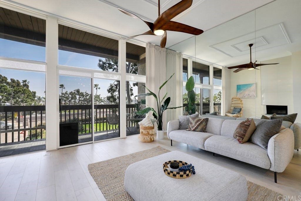 view to canal 30' ceilings - 7338 Marina Pacifica Dr S