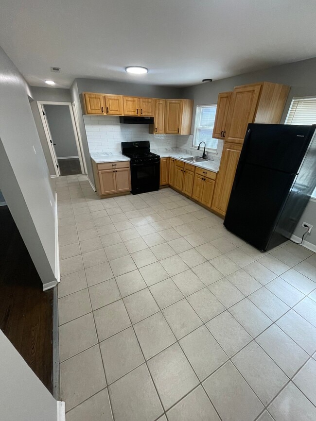 Photo - 7661 S Coles Ave Apartment