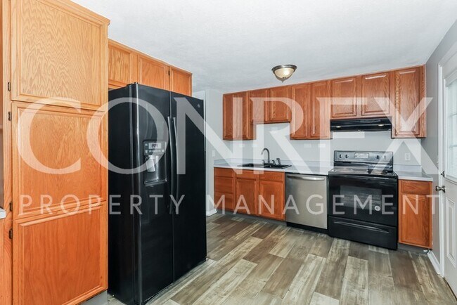 Foto del edificio - Newly Renovated Quad-Level Home!