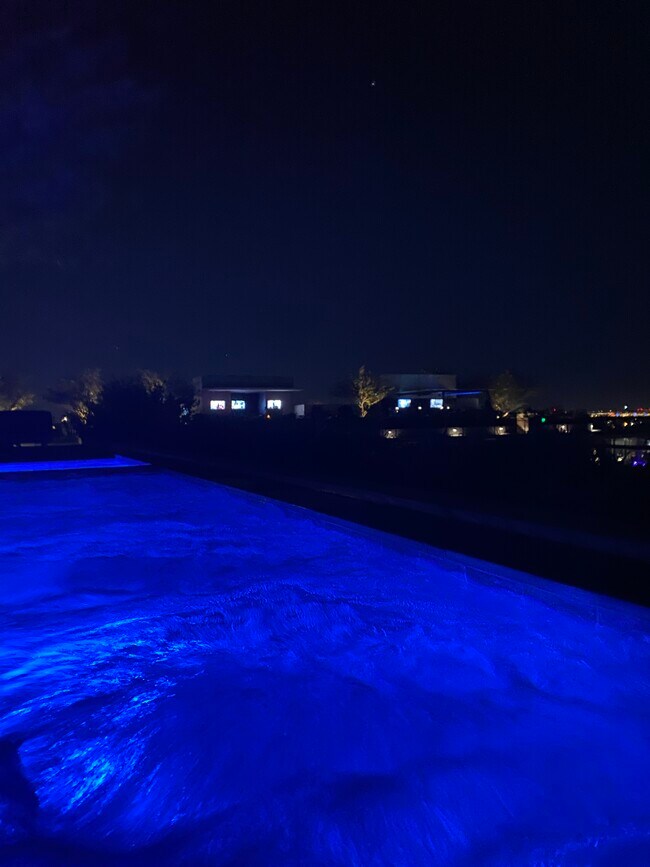 Nightime view of pool - 7180 E Kierland Blvd
