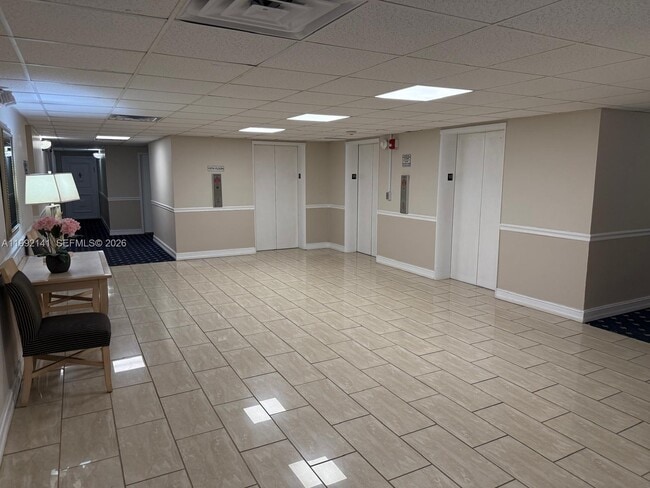 Building Photo - 5005 Collins Ave