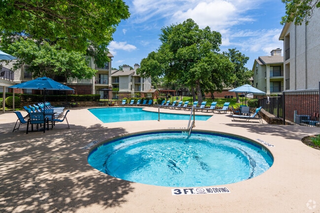 Resort-Style Pool – Sparkling pool with lounge seating in a relaxing community setting - Three60 North Apartments