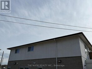 Building Photo - 948 Simcoe St N
