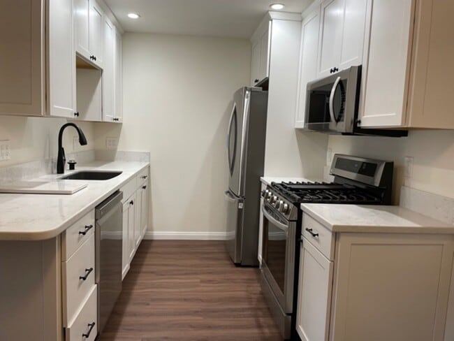 Building Photo - 6600 Warner Ave