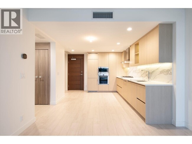 Building Photo - 4880 Lougheed Hwy.