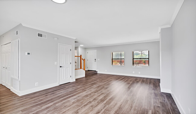 Select homes have upgraded kitchens/baths with wood flooring throughout - Huntington Gateway