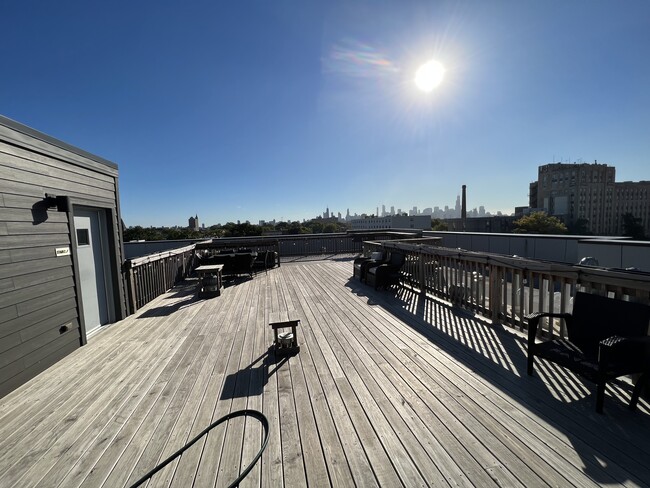 Rooftop Deck Access with Grill and Sweeping Skyline Views - 1509 N Western Ave