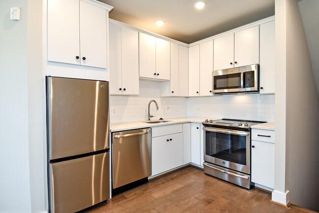 Kitchen featuring high-end finishes - 7227 Georgia Ave NW