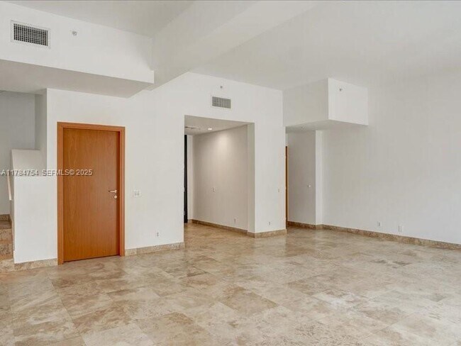 Building Photo - 9499 Collins Ave